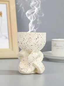 一款精致小巧、设计简约的树脂香炉。适用于家居装饰、办公室、节日庆典和瑜伽场所，兼具装饰和香氛功能。也可作为返校礼物、毕业礼物、促销礼品、情人节礼物、女士礼物或生日礼物。 - 彩色 - 查看 6