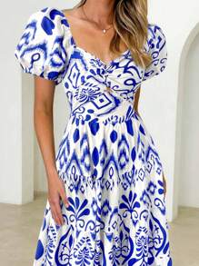 泡泡袖花卉印花露背收腰修身连衣裙，优雅女士长裙