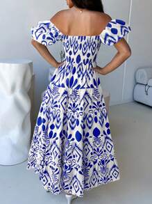 泡泡袖花卉印花露背收腰修身连衣裙，优雅女士长裙