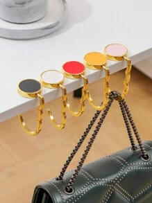 1 pieza Colgador de bolso de moda, perchero plegable, soporte portátil para llaves, gancho de escritorio, colgador de viaje y almacenamiento al aire libre de metal para ropa