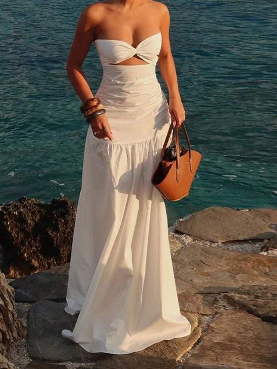 Đầm chữ A cúp ngực khoét eo gợi cảm, thoải mái, thích hợp cho kỳ nghỉ xuân/hè.