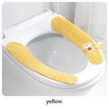 Four Toilet Seat Covers With Cute Fox Patterns In Different Colors (Blue, Orange, Yellow, And Green). They Are Soft, Fluffy, And Shaped To Fit The Toilet Seat. Each Cover Has A Small Fox Detail That Adds A Cute Touch. These Toilet Seat Covers Are Used For Comfort And Warmth, Especially In Cold Seasons.