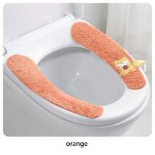 Four Toilet Seat Covers With Cute Fox Patterns In Different Colors (Blue, Orange, Yellow, And Green). They Are Soft, Fluffy, And Shaped To Fit The Toilet Seat. Each Cover Has A Small Fox Detail That Adds A Cute Touch. These Toilet Seat Covers Are Used For Comfort And Warmth, Especially In Cold Seasons.