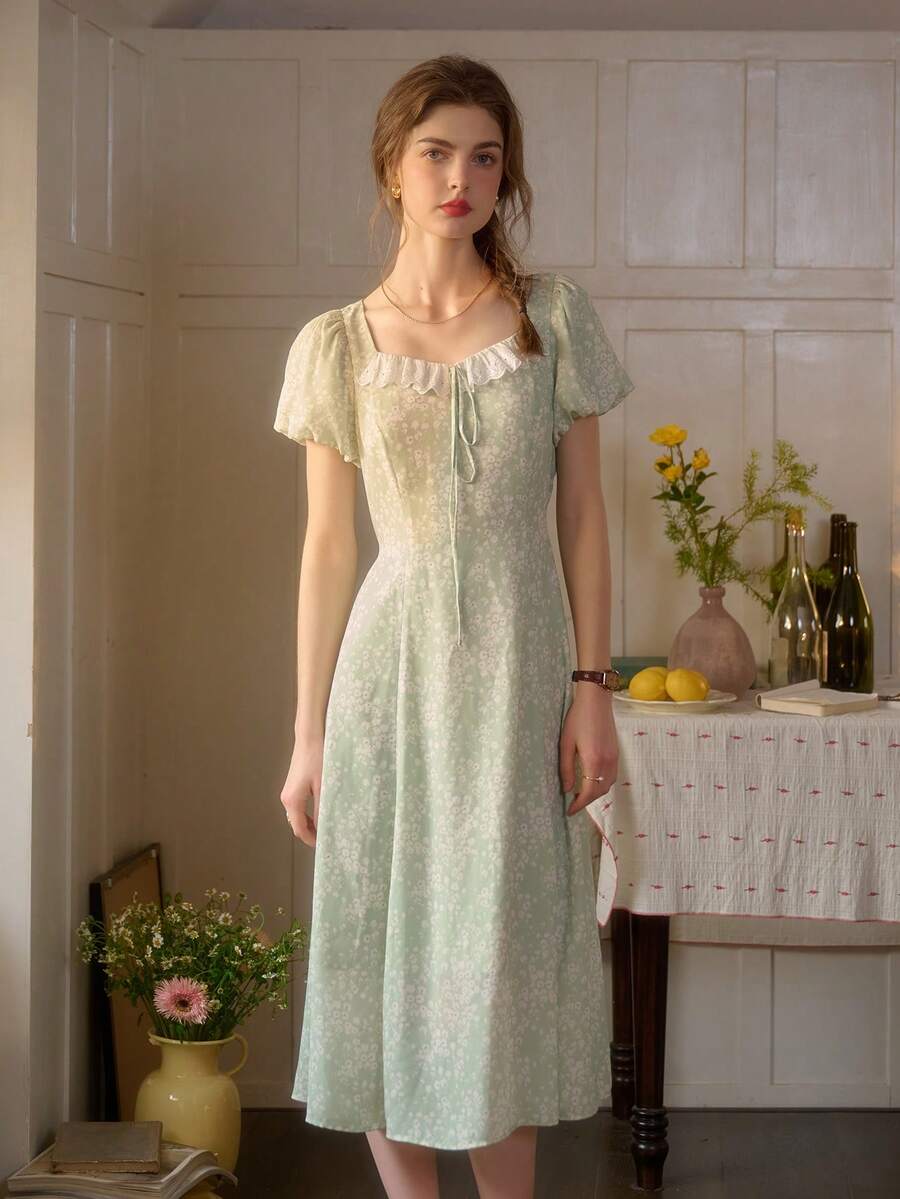 Đầm dài tay ôm dáng thanh lịch phong cách retro dành cho nữ, thích hợp cho kỳ nghỉ xuân, với họa tiết hoa phối màu. - màu xanh lá - Xem 1