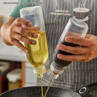 1 pieza Botella plástica de cocina para exprimir aceite con pico vertedor, botella de ketchup, dispensador de condimentos y salsas, botella medidora de vinagre, lata de aceite a prueba de fugas, dispensador de aceite/vinagre, recipiente para sazonar, dispensador de aceite de oliva para cocinar y asar, accesorio de cocina, material de PP, botella de aceite