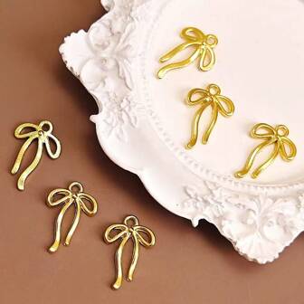 14 pièces Perles de ruban en nœud papillon en alliage de zinc pour la décoration de bracelet à enfiler