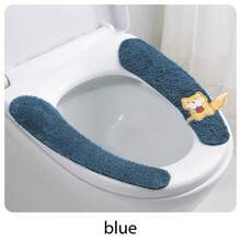 Four Toilet Seat Covers With Cute Fox Patterns In Different Colors (Blue, Orange, Yellow, And Green). They Are Soft, Fluffy, And Shaped To Fit The Toilet Seat. Each Cover Has A Small Fox Detail That Adds A Cute Touch. These Toilet Seat Covers Are Used For Comfort And Warmth, Especially In Cold Seasons.