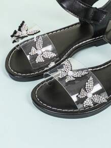 1双黑色幼儿/小女孩平底凉鞋，饰有闪亮珍珠和蝴蝶图案，透明PU鞋带，魔术贴搭扣，圆头设计，柔软防滑鞋底，可爱波西米亚公主风沙滩鞋，适合3-12岁女孩，日常、派对、海滩、上学等场合穿着，2026春夏款。 - 黑色 - 查看 7