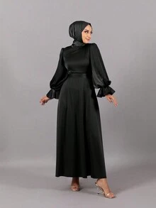 Vestido de manga larga con cuello redondo y volantes, elegante y recatado, con estilo árabe