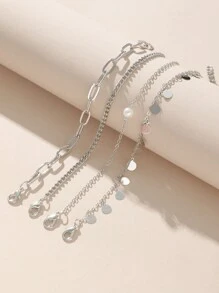 4pcs Bohemian Metal Minimalist Layered Bracelet Set (Random Number Of Circular Pendant Charms)