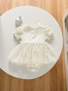 Modny, swobodny, koronkowy kombinezon dla dziewczynki z falbankami i siateczką