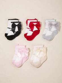 Elegante set de 5 pares de calcetines para bebé con detalles de lazos preciosos