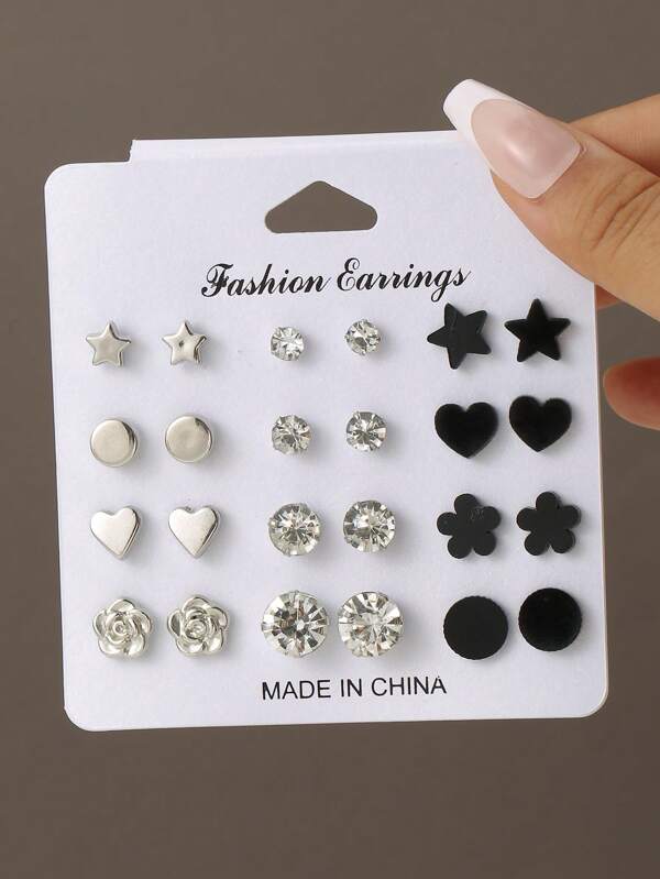 Set de 24 pares de aretes de niña con diseños de corazón, estrella, flor y geométrico