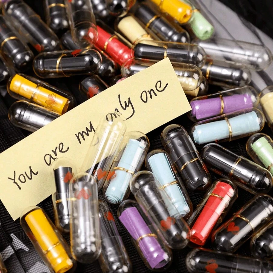 50 pezzi Capsule-Bottiglie trasparenti mini carine a forma di capsula, contenitore per messaggi, lettere, amicizia, note d'amore, adatto per decorazioni matrimonio, regali di San Valentino, bomboniere per feste - Multicolore - Visualizzare 1