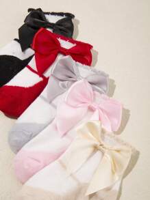 Elegante set de 5 pares de calcetines para bebé con detalles de lazos preciosos