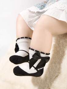 Elegante set de 5 pares de calcetines para bebé con detalles de lazos preciosos