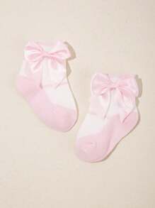 Elegante set de 5 pares de calcetines para bebé con detalles de lazos preciosos