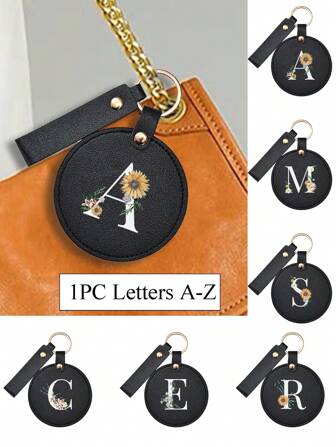 这款印有雏菊、花朵和植物图案的小镜子，方便携带，可悬挂，字母A-Z，是馈赠佳品。它既是化妆镜，也是口袋镜，可折叠便携，无需打孔，使用方便，适合工作、娱乐和旅行。是送给女性、母亲、教师、朋友、学生、返校人士和教师的绝佳礼物，也是情人节礼物、化妆品、平价物品、房间装饰、梳妆台、旅行、卧室、化妆配件、镜子、化妆镜、迷你镜、粉盒镜、小镜子、手持镜、平价物品、圣诞礼物、化妆品、化妆工具、便宜货、礼物、女士礼物、圣诞礼物的理想之选。