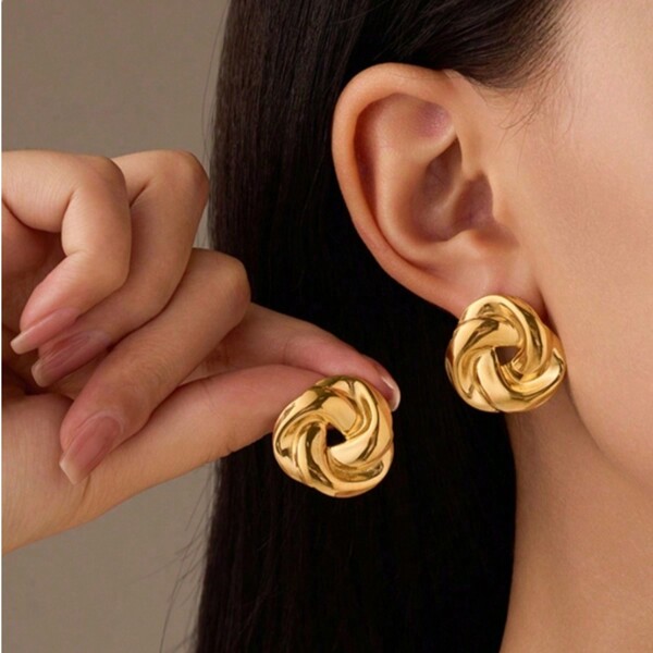Pendientes vintage de acero inoxidable con nudo