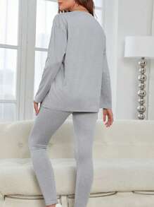 2 pièces Ensemble de loisirs pour femmes, ensemble deux-pièces, manches longues amples, pantalon slim, couleur unie. Ensemble de loisirs pour le printemps et l'été, convenant pour la course, les loisirs à la maison. Motifs d'impression : LOVE DREAMER WILD FAIT PEACE - Gris pâle - Voir 7