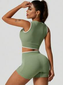 1 Conjunto de ropa deportiva de primavera para mujer con media cremallera, top corto sin mangas y shorts ajustados, de ajuste ceñido