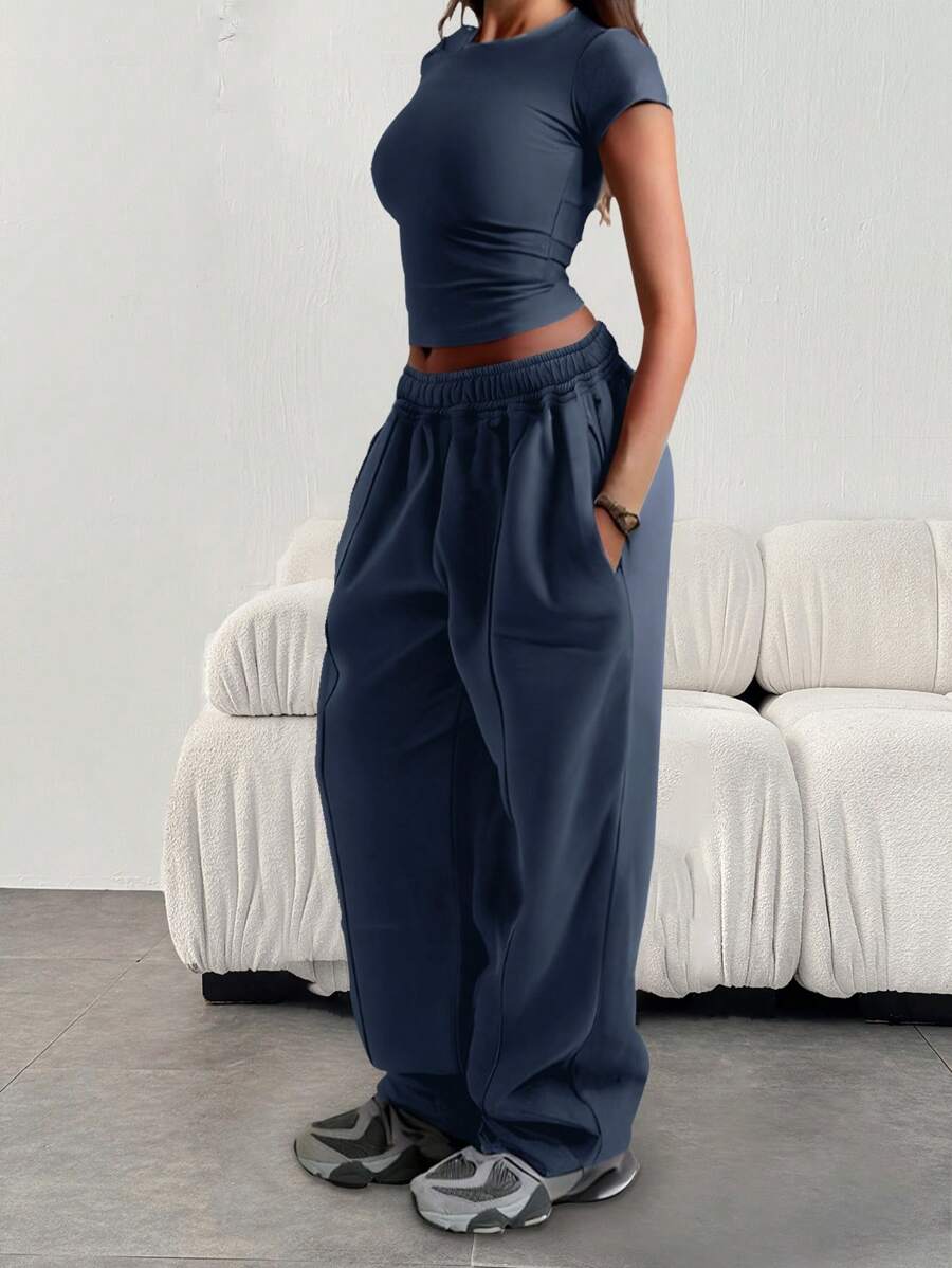 Pantalones deportivos sólidos y sueltos con cintura elástica y bolsillos para mujer - Neblina azul - Ver 1
