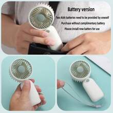 1 pieza Mini ventilador portátil a batería para volver al colegio, funciona con 2 pilas AAA (no incluidas), viene con cordón