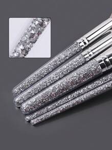 11件套专业化妆刷套装：5支高级水钻手柄化妆刷、1支无痕粉底刷、1支超细眼线刷、4个美妆蛋。