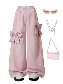 少女时尚宽松蝴蝶装饰阔腿裤，休闲简约，适合春秋季户外、派对、上学和日常穿着。