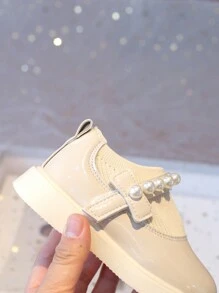 Nuevos zapatos Mary Jane para niñas, diseño con lazo de perla, zapatos planos para niños, uso casual diario, versátil, fácil de poner y quitar con para niños pequeños