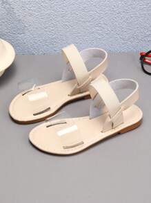 新款春夏女童连体拖鞋，时尚休闲风格，外穿，罗马风格休闲鞋，宽松拖鞋，舒适，米色和黑色平底图案拖鞋。 - 米色 - 查看 1