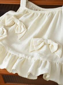 年轻女孩 2 件套优雅可爱蝴蝶结装饰舒适吊带上衣和荷叶边下摆阔腿裤套装夏季 - 米色 - 查看 3