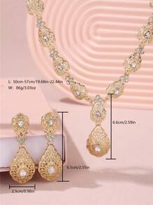 An Arabic-Style Set Of Fashionable And Popular Palace Hollow-Out Diamond-Inlaid Teardrop Pendant, Earrings, And Necklace Combo For Brides To Wear At Weddings, Banquets, Parties And Dance Parties.