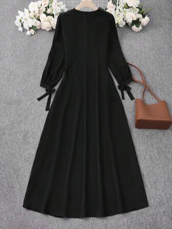 女式纯色圆领长袖带口袋休闲阿拉伯风格连衣裙，端庄