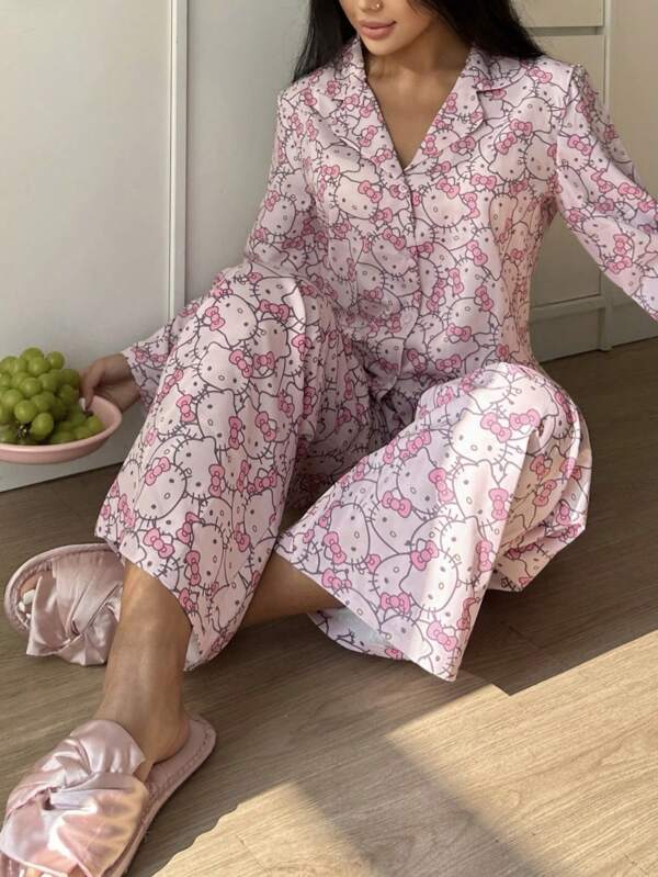 Sanrio Conjunto de 2 piezas de pijama con estampado de Hello Kitty para mujer, que incluye blusa de manga larga con cuello vuelto y botones talla grande pantalón con cintura elástica