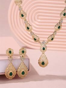 An Arabic-Style Set Of Fashionable And Popular Palace Hollow-Out Diamond-Inlaid Teardrop Pendant, Earrings, And Necklace Combo For Brides To Wear At Weddings, Banquets, Parties And Dance Parties.