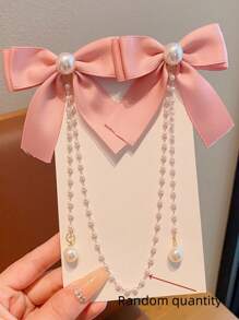 1 件女孩时尚甜美珍珠蝴蝶结和流苏发夹，由于面料批次不同，略有色差是正常现象，请参考包装卡和实际产品。随机珍珠数量 - 粉色 - 查看 6