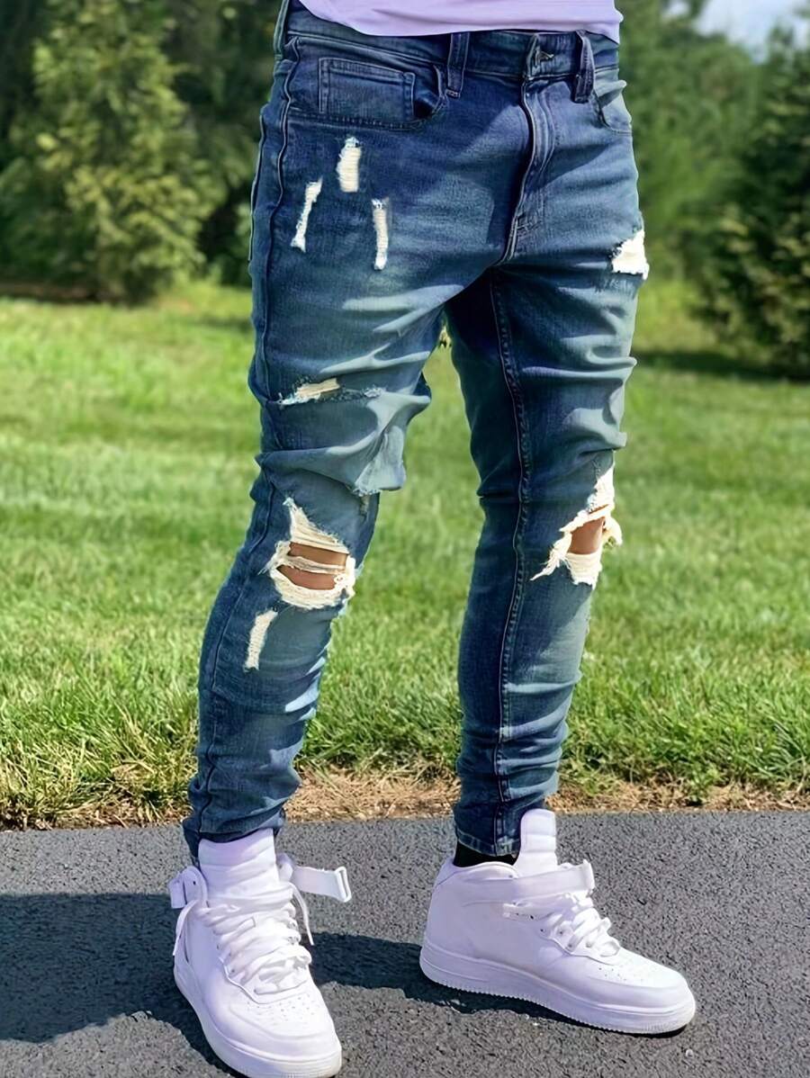 A Pair Of 510g Ripped Bullet-Hole Denim Fabric Jeans, With A Composition Of 65% Cotton And 35% Polyester Fiber, Men's Casual Denim Trousers. - Medium Wash - View 1