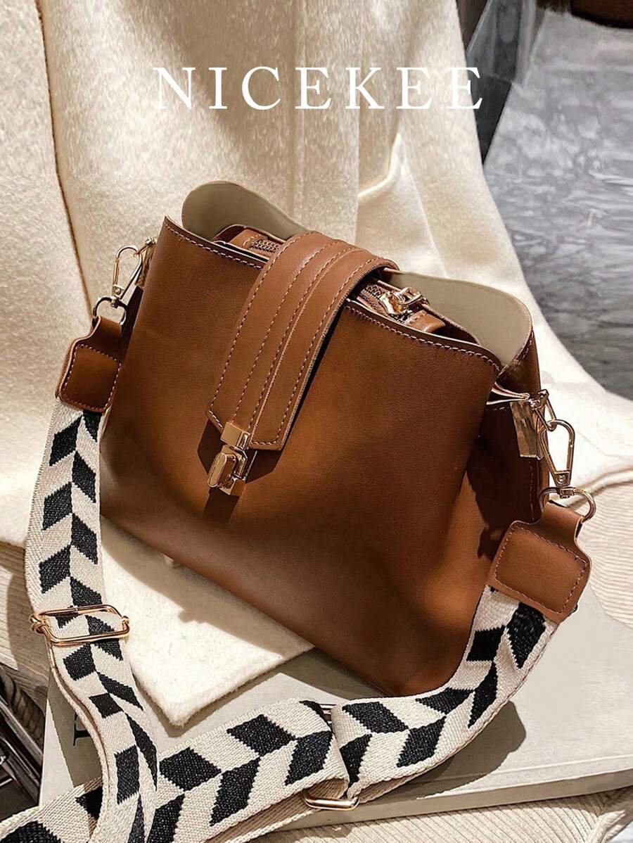 时尚百搭复古风斜挎包，小众设计，纯色，简约轻巧，可调节肩带水桶包，几何肩带单肩包，适合上班、通勤、外出、约会、逛街（肩带图案随机）。 - 棕色 - 查看 1