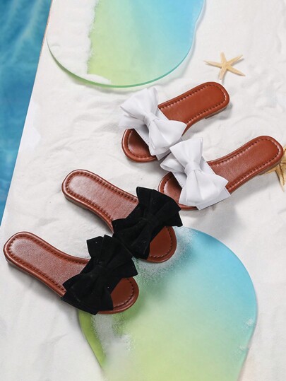 1 par de sandalias minimalistas con tira de lazo, de moda para niñas, planas y elegantes para la casa/playa