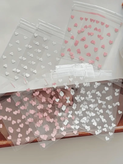 50/100/150/200pcs Creative Transparent Heart-Shaped Self-Adhesive Packaging Bags For Cookies, Candies, And Desserts, Suitable For Gifts And Favor Packaging, Ideal Valentine's Day, Weddings, And Other Celebrations