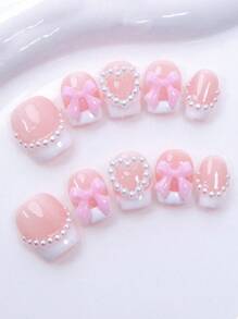 10片手工美甲贴片，短款可爱方形法式美甲，珍珠蝴蝶结设计，爱心珍珠美甲，甜美可爱全覆盖式按压假指甲，情人节美甲，居家DIY美甲，四季美甲，适合女性旅行、派对、约会，可拆卸可重复使用，日常办公美甲佩戴。节日美甲按压式美甲贴片，美甲用品，手工按压式美甲贴片。 - 彩色 - 查看 3