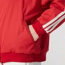 Adidas 女款多功能休閒夾克 CW REV JKT 紅色保暖內裡可正反穿運動上衣 JM8833 - 能量紅 - 查看 4