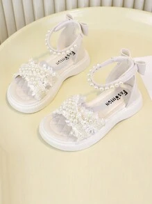 Buty antypoślizgowe z miękkiej gumy dla małych dzieci, zdobione perłowymi kryształkami, modny i prosty design, beżowe i czarne, odpowiednie na zewnątrz, w podróż, na plażę i do domu