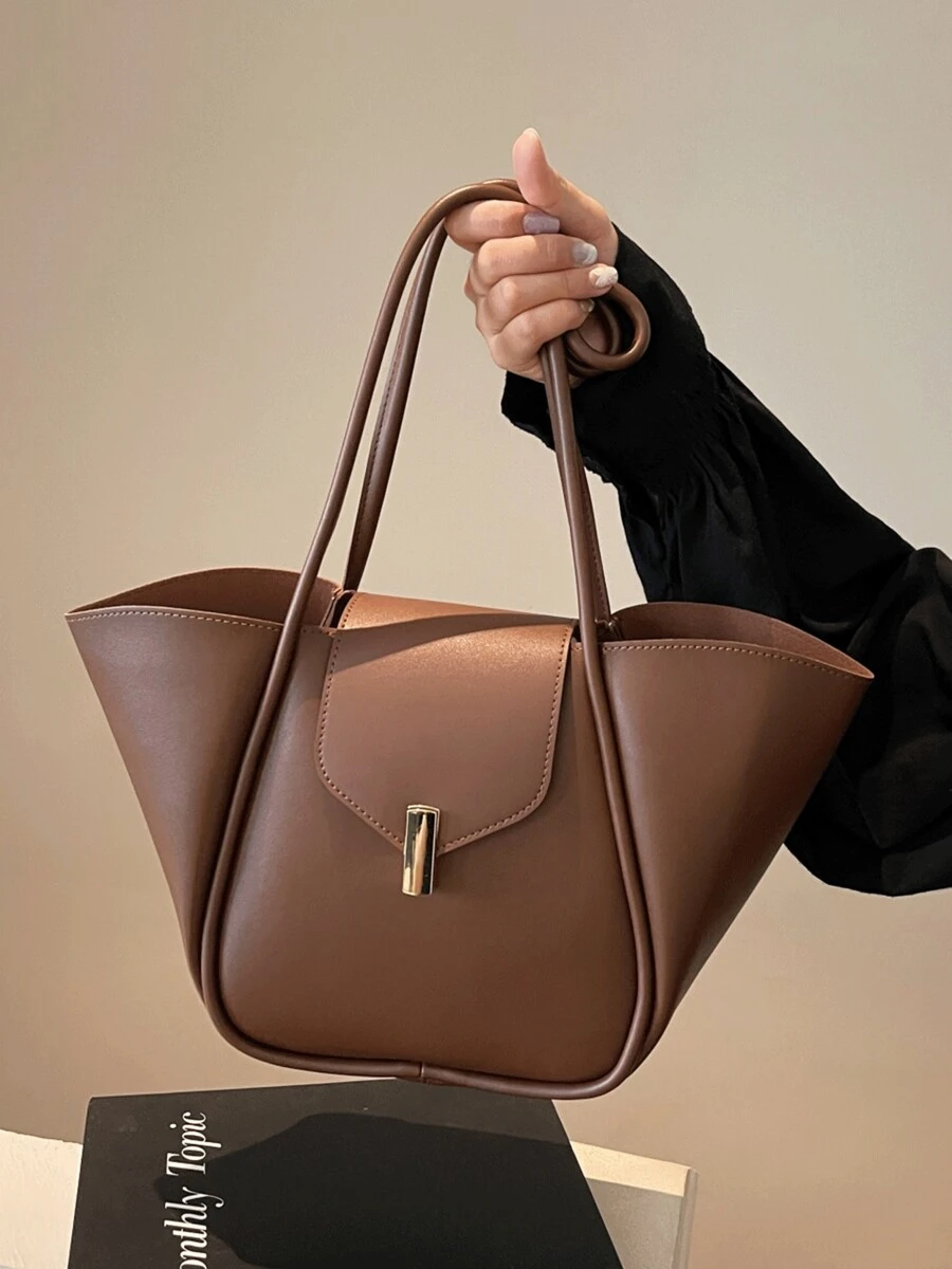 新款时尚经典百搭纯色PU防水手提包，磁扣闭合设计，大容量单肩托特包，翼形包型，商务通勤包，适合旅行、购物、通勤、外出和约会。商务休闲女包，完美适用于办公室商务和工作场合。新款时尚大容量女包。 - 咖啡棕 - 查看 1