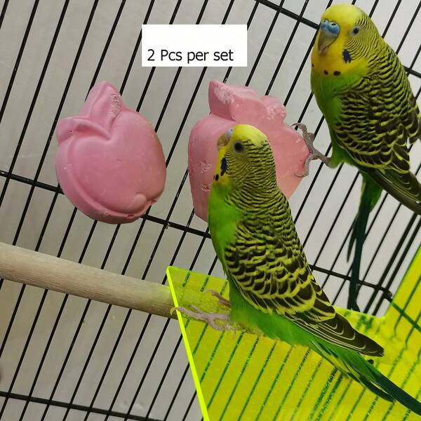 Set de 2 juguetes para masticar de loro en forma de manzana en color rosa intenso, tamaño L + tamaño S