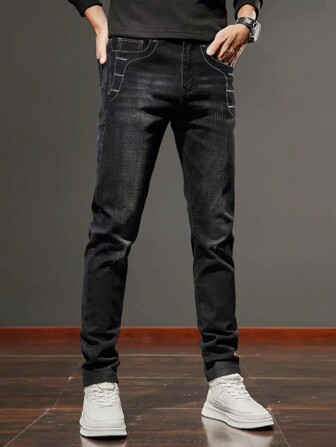 男士时尚创意弹力仿纽扣门襟修身牛仔裤
