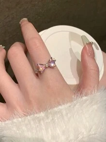 1 pièce Bague avec nœud papillon rose et strass, conception unique de bague de mode réglable rose en forme de cœur pour femmes