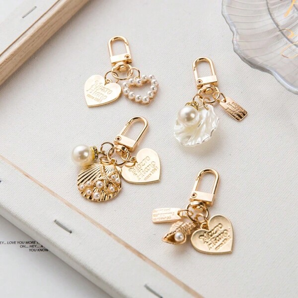 1 pieza Llavero vintage con perla, accesorio elegante de lazo de rosa y concha para decorar estuche de audífonos, bolso de mano o accesorios de automóvil, llavero creativo de corazón metálico y concha con perla, pequeño regalo adorable