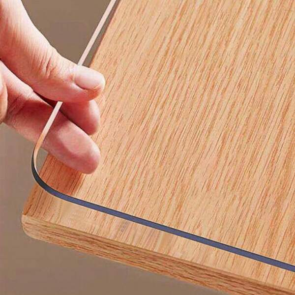 Toalha de mesa transparente de PVC com 1,0 mm de espessura, à prova d'água, resistente a arranhões, ao calor e fácil de limpar. Película decorativa e protetora para superfícies de mesa, perfeita para mesas de jantar familiares e de hotéis, mesas de centro e uso doméstico. Fornecido em 1 peça.